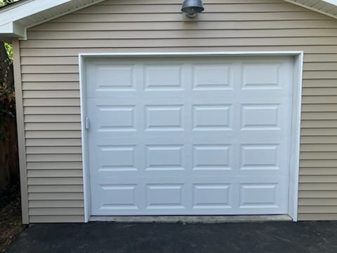 Raised-panel residential garage door